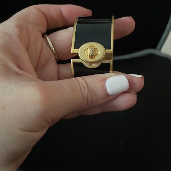 Beautiful Coach Wide Black and Gold Bangle with Turnlock Design. - Picture 5 of 6